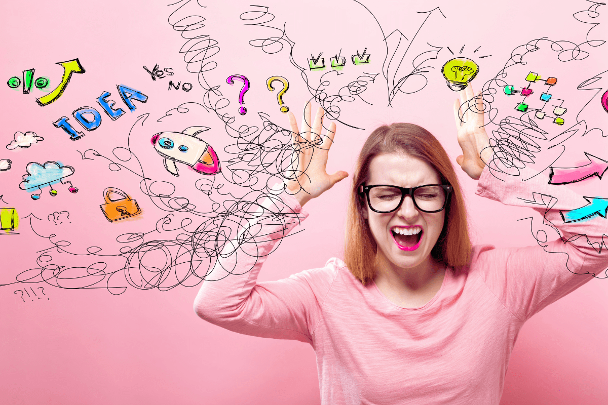 woman with glasses looking overwhelmed by her thoughts to symbolize ADHD in women