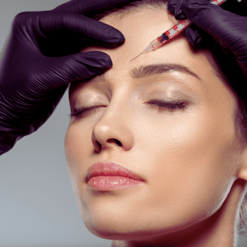 woman receiving neurotoxin treatment at our destin aesthetics clinic